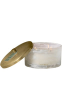 Load image into Gallery viewer, Thymes Frasier Fir multi-wick candle in a wide, softly marbled white glass vessel with gold Thymes lettering, shown lit beside a coordinating brushed gold lid.
