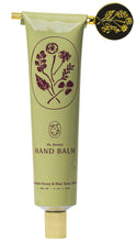 Load image into Gallery viewer, Hand balm tube with floral design and gold cap on white background