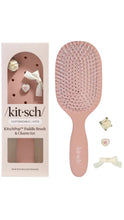 Load image into Gallery viewer, Pink paddle brush with 'kitsch' branding next to its packaging on a white background