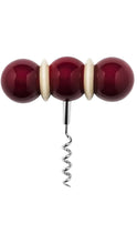 Load image into Gallery viewer, Sculptural corkscrew featuring a horizontal handle with three glossy burgundy spheres separated by ivory-colored discs, and a polished silver spiral wine opener extending from the center.