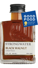 Load image into Gallery viewer, Strongwater Black Walnut Cocktail Bitters in a 3 fl. oz. glass bottle with amber liquid, black cap, and cream label, featuring a Good Food Awards Winner 2024 badge.
