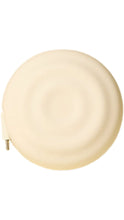 Load image into Gallery viewer, Cream-colored round retractable charger with a smooth compact design