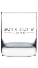 Load image into Gallery viewer, Clear glass tumbler with engraved coordinates and city name on a white background