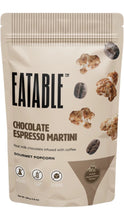 Load image into Gallery viewer, Beige bag of Eatable Chocolate Espresso Martini Gourmet Popcorn featuring chocolate-covered popcorn and coffee bean graphics, with bold black and brown lettering.