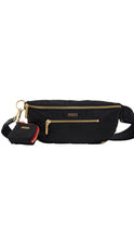 Load image into Gallery viewer, A black nylon fanny pack with gold-tone hardware, featuring a front zippered pocket, a detachable pouch with red lining, and a black adjustable strap, shown against a plain white background.
