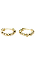Load image into Gallery viewer, A pair of gold huggie hoop earrings with a textured, beaded outer edge, displayed on a clean white background.