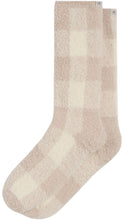 Load image into Gallery viewer, Pair of soft, fuzzy crew socks in a pale blush beige with oversized cream polka dots and small branded tabs at the cuffs.