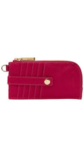 Load image into Gallery viewer, A bright pink faux-leather zip-around wallet with gold-tone hardware, featuring a front strap with a gold snap button and a gold brand plaque.
