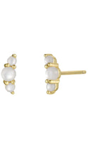 Load image into Gallery viewer, A pair of gold and white pearl stud earrings shown against a plain white background, with one earring facing forward and the other angled to show the post.
