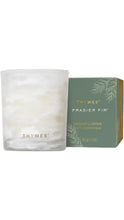 Load image into Gallery viewer, Thymes Frasier Fir aromatic votive candle in a frosted white glass vessel with gold logo lettering, shown beside its sage green box with fir branch details.
