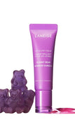 LANEIGE Lip Glowy Balm in Gummy Bear flavor, shown in a purple squeeze tube with three translucent purple gummy bears and pink product residue on a white background.