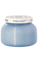 Load image into Gallery viewer, Blue candle jar with 'Volcano' branding on a white background
