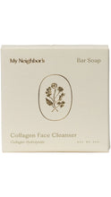 Load image into Gallery viewer, Cream-colored box of My Neighbor’s Collagen Face Cleanser Bar Soap, featuring minimalist gold lettering and a delicate botanical illustration. The 6 oz bar is labeled with collagen hydrolysate and shown against a white background.
