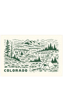 Load image into Gallery viewer, A cream-colored postcard featuring a dark green illustrated mountain landscape with trees, tents, and the word "COLORADO" at the bottom, centered on a white background.
