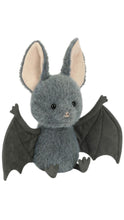 Load image into Gallery viewer, A plush toy bat in dark gray with large pale pink inner ears and dark gray wings, shown against a plain white background.

