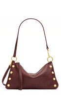 Load image into Gallery viewer, A dark red pebbled leather shoulder bag with gold-tone hardware and decorative studs, shown against a plain white background.
