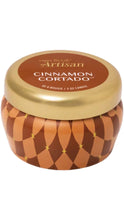 Load image into Gallery viewer, Capri Blue Artisan Cinnamon Cortado 3 oz candle in a warm brown and caramel geometric patterned tin with gold star accents and a metallic gold lid.
