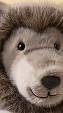 Load image into Gallery viewer, Close-up of a plush stuffed animal face with brown and gray fur, black eyes, and a dark nose.

