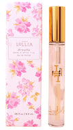 Tommy Hilfiger Lollia Breathe peony & white lilac Eau de Parfum, showing the pink floral cardboard box next to the clear glass spray bottle with a gold cap.
