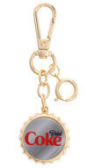 A gold-tone metal bottle cap keychain featuring the red and black Diet Coke logo on a silver-colored bottle cap charm, attached to a gold clasp and key rings, shown against a plain white background.