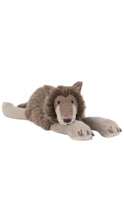 Load image into Gallery viewer, A plush stuffed animal shaped like a wolf, lying down, with brown fur, a beige snout and inner ears, and grayish paws, shown on a plain white background.

