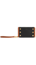 Load image into Gallery viewer, Black wristlet with gold accents on a white background
