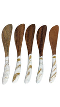 Load image into Gallery viewer, Set of five wooden spreader knives with glossy white and metallic gold marbled handles.
