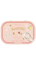 Load image into Gallery viewer, A Paddywax 'Martini' scented soy wax candle in a pink rectangular tin with rounded corners, decorated with cocktail illustrations and a silver pull tab on the front.
