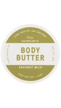 Load image into Gallery viewer, Old Whaling Co. Coconut Milk body butter in a round white 8 oz. container with an olive green and white label, made with shea butter and aloe.
