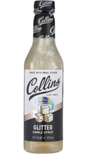 Load image into Gallery viewer, Collins Glitter Simple Syrup in a 12.7 fl oz bottle, featuring shimmering edible glitter and a black-and-white label with sugar cube artwork.

