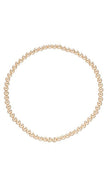 gold beaded bracelet on a white background