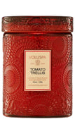 Voluspa Tomato Trellis scented candle in a textured red glass jar with a cream-colored label.
