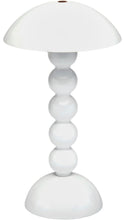 Load image into Gallery viewer, Glossy white table lamp featuring a wide, dome-shaped mushroom shade, sculptural stem of five stacked rounded spheres, and a matching rounded pedestal base.
