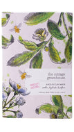 The Cottage Greenhouse Kaolin Clay Mask in a square paper sleeve featuring a botanical and bee pattern on a pale pink background.