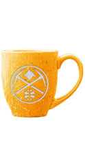 Load image into Gallery viewer, A yellow speckled ceramic mug with a white-grey Denver Nuggets logo on the front, set against a plain white background.
