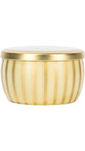 Load image into Gallery viewer, Gold striped tin candle with a rounded shape, alternating metallic gold and cream vertical stripes, and a matching gold lid.

