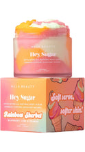 Load image into Gallery viewer, NCLA BEAUTY Hey Sugar exfoliating body scrub jar shown above its matching retail box. The jar contains a pastel rainbow-colored scrub with pink, orange, yellow, and white tones.
