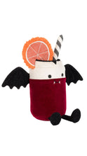 Load image into Gallery viewer, A plush vampire cocktail toy featuring a deep red body, a white cup rim, black bat wings, a black-and-white striped straw, a glittery orange slice garnish, and small black feet, shown on a plain white background.
