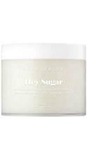 Load image into Gallery viewer, NCLA BEAUTY Hey Sugar Exfoliating All-Natural Body Scrub in a frosted off-white jar with a white lid, shown on a plain white background.
