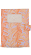 Load image into Gallery viewer, Floral patterned pouch with 'Aloha' label on a white background

