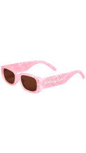 Load image into Gallery viewer, Pink marbled sunglasses with dark brown lenses and 'Birthday Girl' text on the side, shown on a plain white background.
