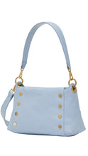 Load image into Gallery viewer, Light blue handbag with gold buttons and a matching strap on a white background
