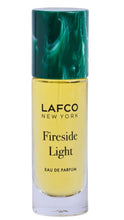 Load image into Gallery viewer, Lafco New York Fireside Light Eau de Parfum in a clear glass bottle with pale yellow liquid, a dark green marbled cap, and black text on a white background.
