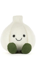 Load image into Gallery viewer, A knitted garlic plush toy in off-white with dark green feet and a simple black embroidered face, shown against a plain white background.
