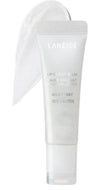 LANEIGE Milky Way Lip Glowy Balm in a frosted white squeeze tube with a matching white cap, shown against a plain white background with a textured white swatch behind it.