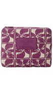 Purple and white patterned pouch with Aloha Collection label on a white background