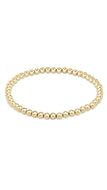 Gold beaded bracelet on a white background
