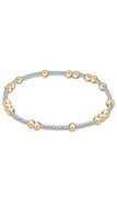 Two-toned bracelet with gold and silver beads on a white background