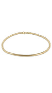 Gold bracelet on a white background