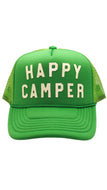 A bright green trucker hat with 'HAPPY CAMPER' printed in cream-colored letters on the front, set against a plain white background.